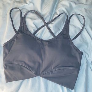 kitty gains size small sports bra. blue